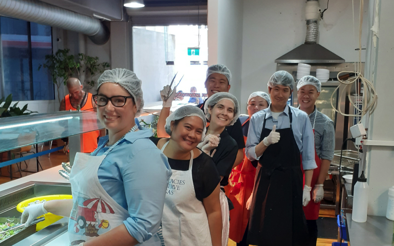 Cooking staff, smiling.