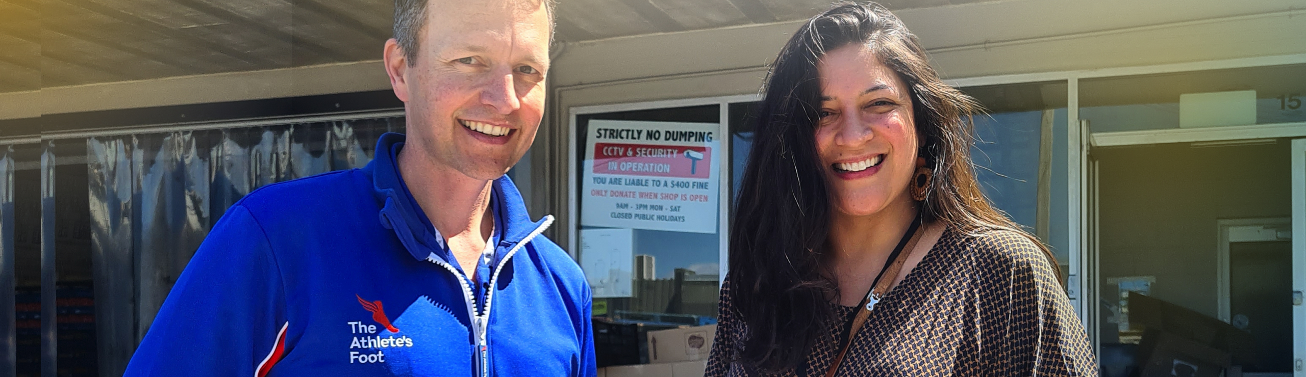 Two smiling supporters.